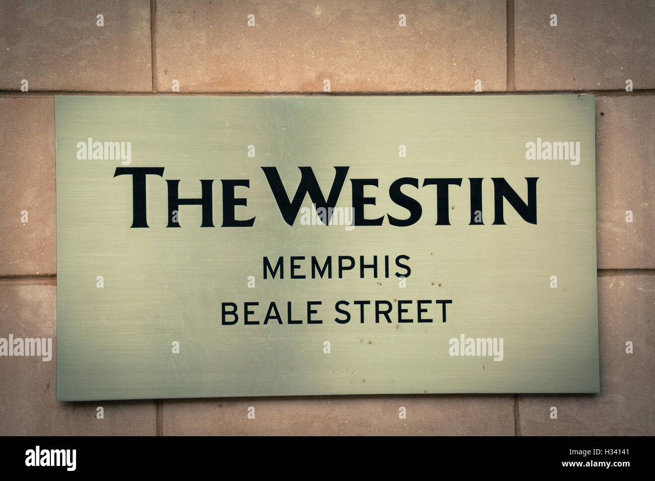 The iconic and luxurious Westin Hotel's sign on stone building on Beale Street in Memphis TN Stock Photo