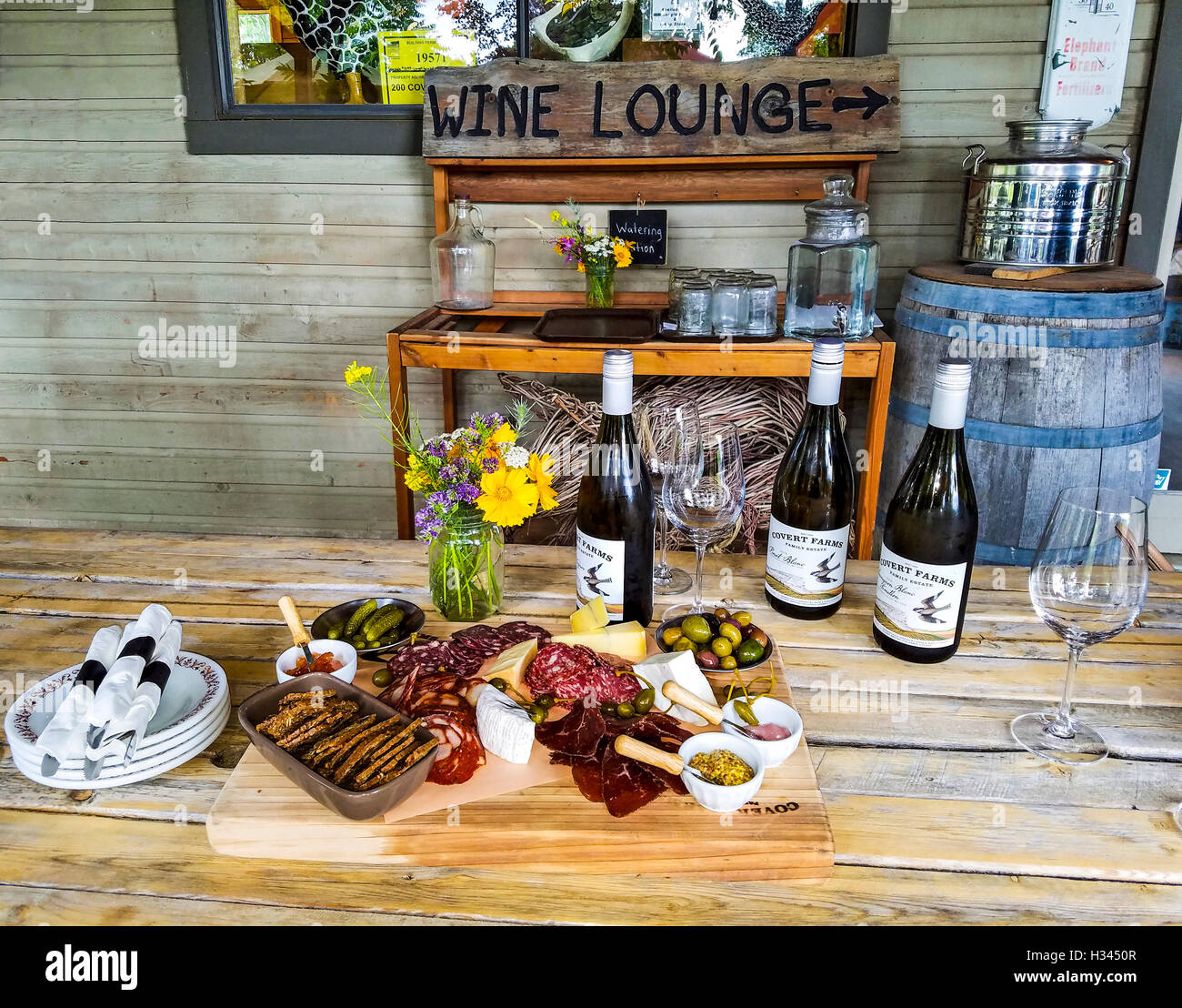 Brief snack of local cured meats and cheeses at Covert Farms during farm tour in the southern Okanagan Valley, BC, Canada. Stock Photo