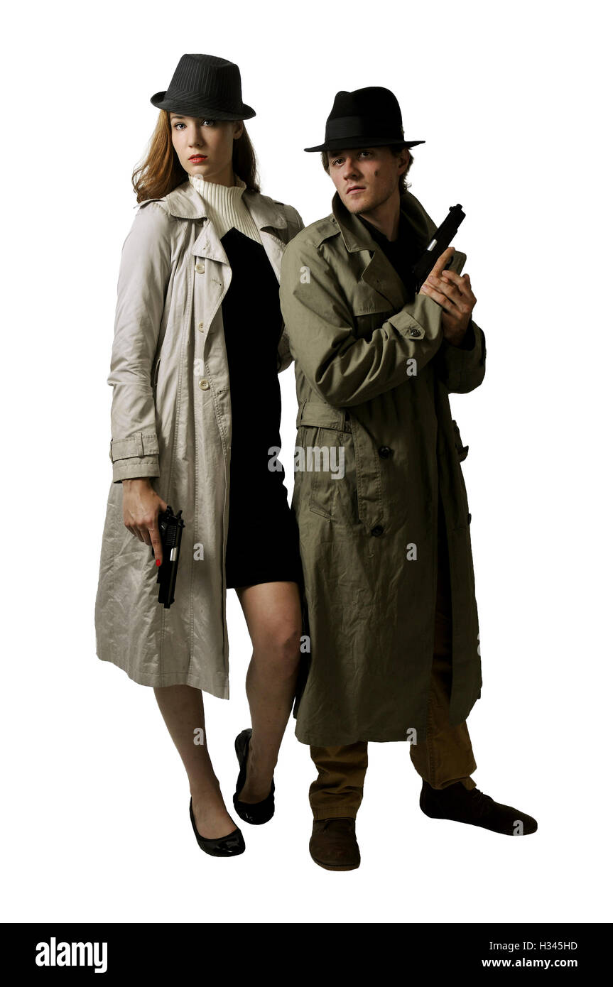 Man and woman secret agent spies with guns Stock Photo