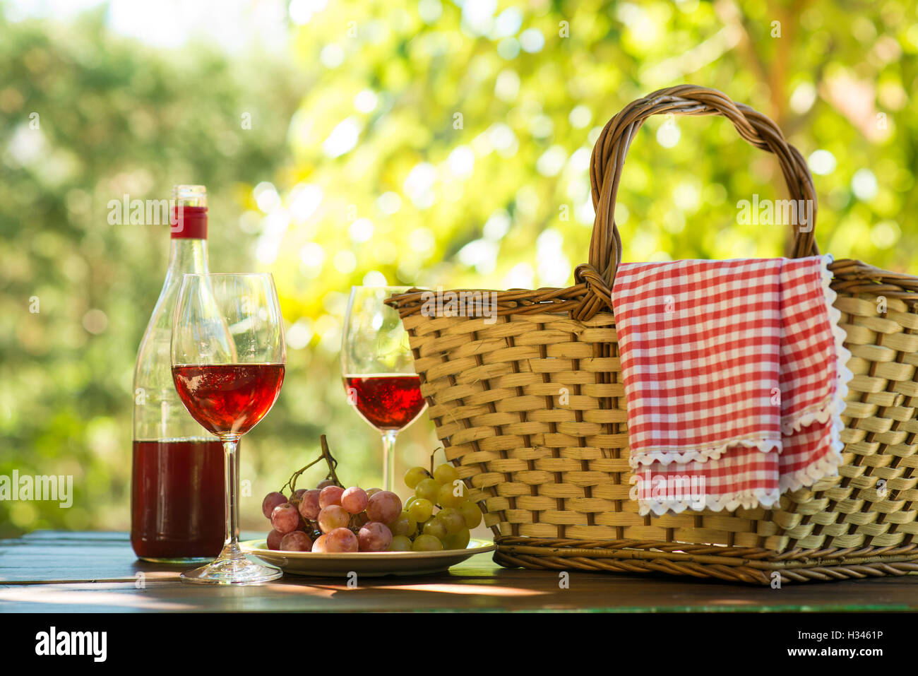 red napkin picnic basket and table place. Copy space Stock Photo