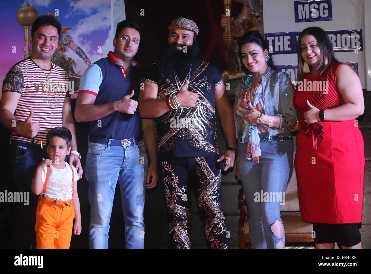 Dera Sacha Sauda (DSS) spiritual head Gurmeet Ram Rahim Singh with family  music launch film MSG The Warrior Lion Heart Mumbai Stock Photo - Alamy