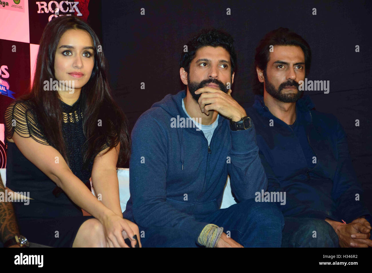 Bollywood actors Shraddha Kapoor, Farhan Akhtar and Arjun Rampal during the music launch of the movie Rock On 2, in Mumbai Stock Photo