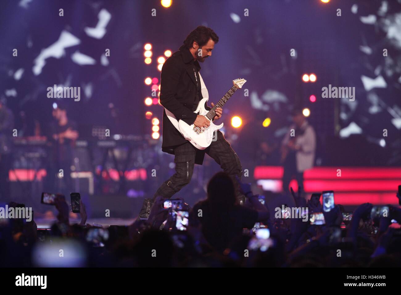 Bollywood actor Arjun Rampal perform during the live concert and music launch of the movie Rock On 2, in Mumbai Stock Photo