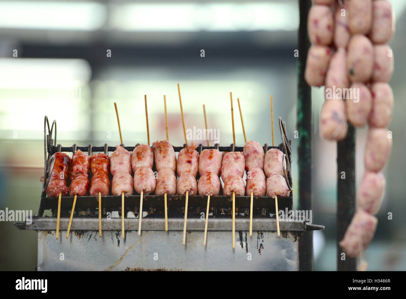 Pork sausages barbecued Stock Photo