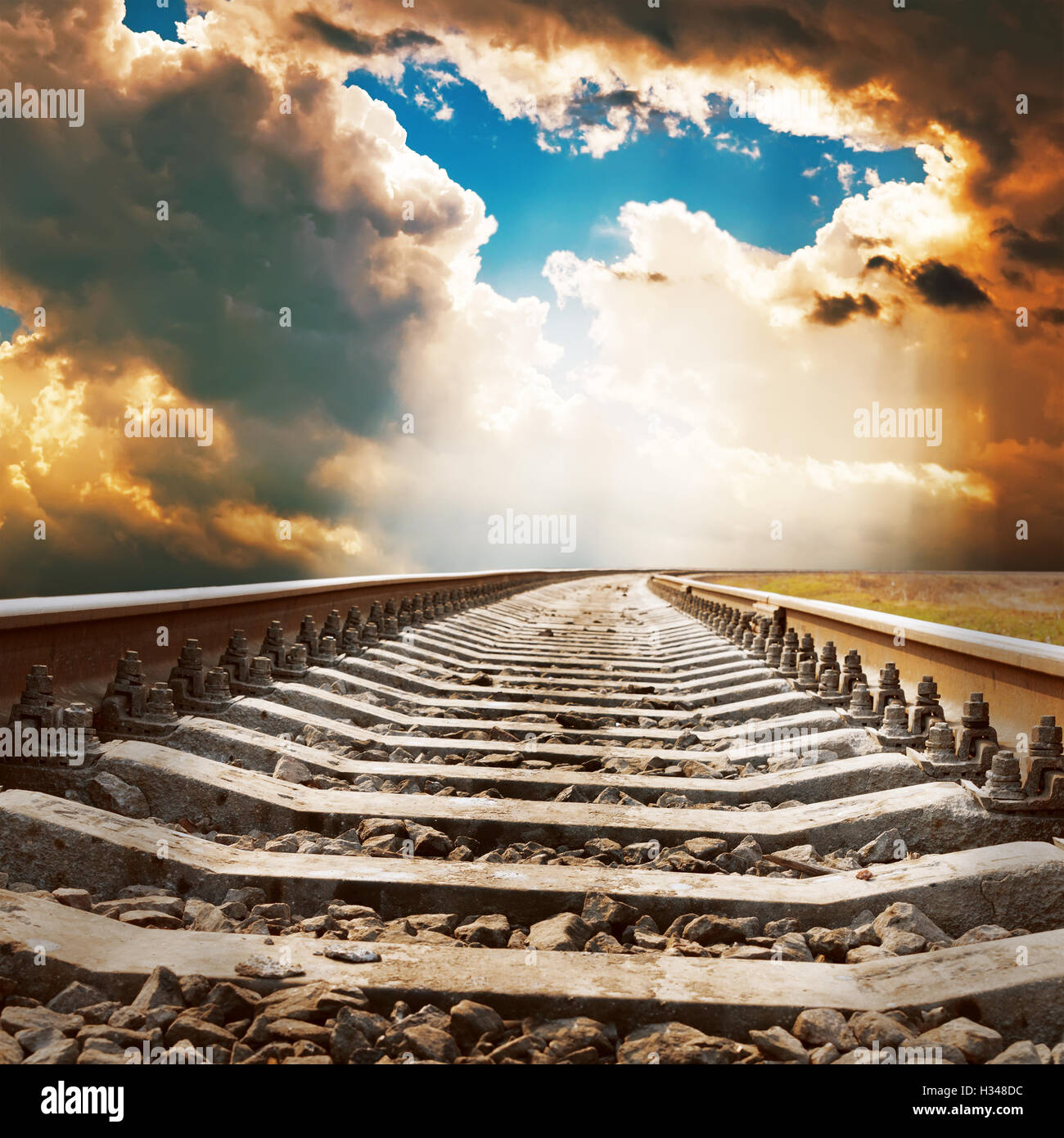 dramatic sky over railroad Stock Photo