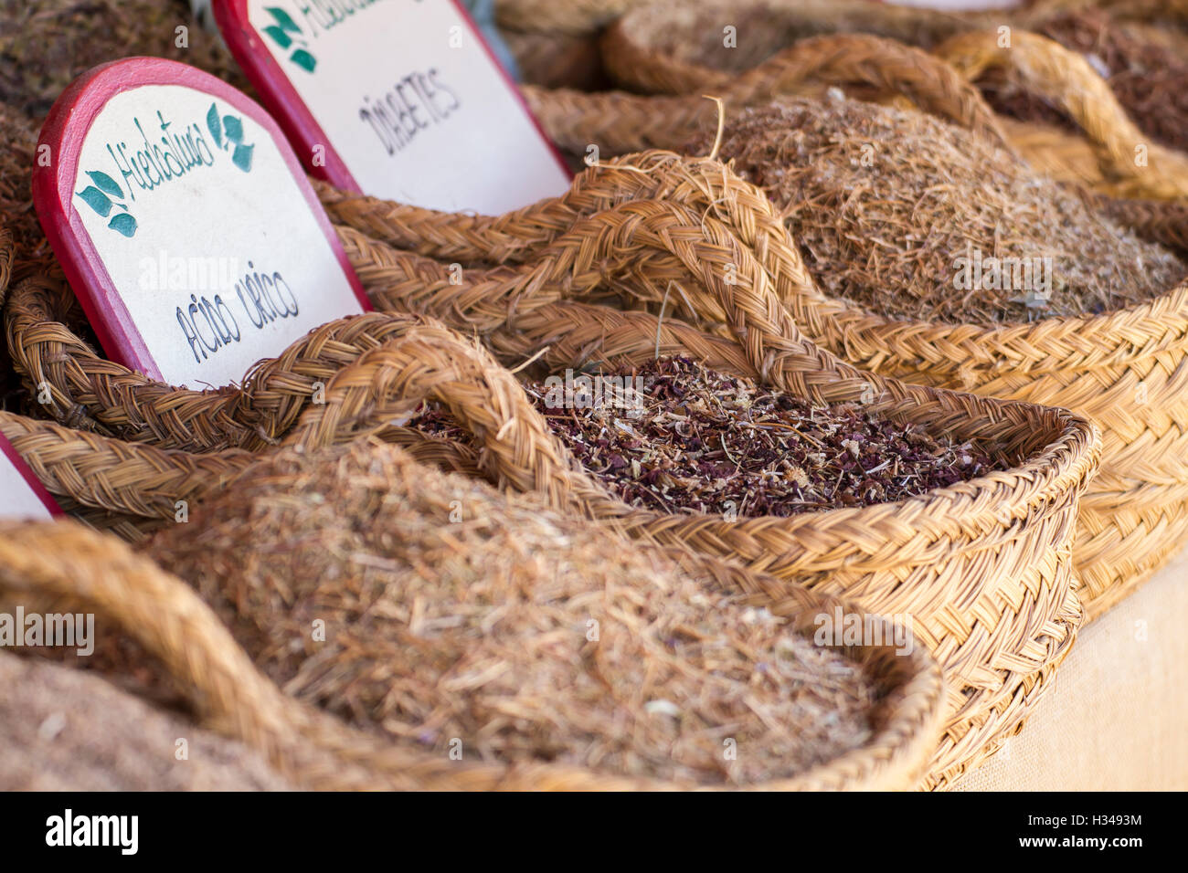 Medical, wicker baskets stuffed medicinal healing herbs Stock Photo Alamy