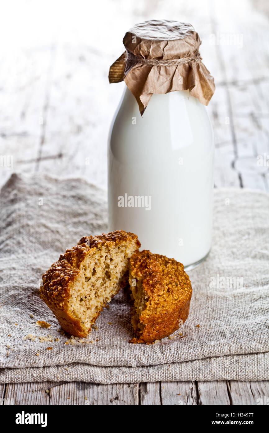 bottle of milk and fresh baked bread Stock Photo