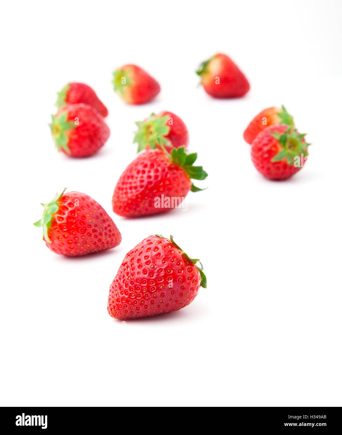 Strawberries isolated over white background Stock Photo - Alamy