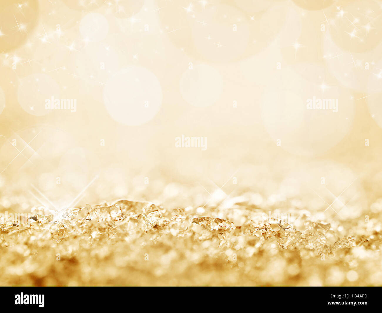 Golden snow and bokeh Christmas background Stock Photo