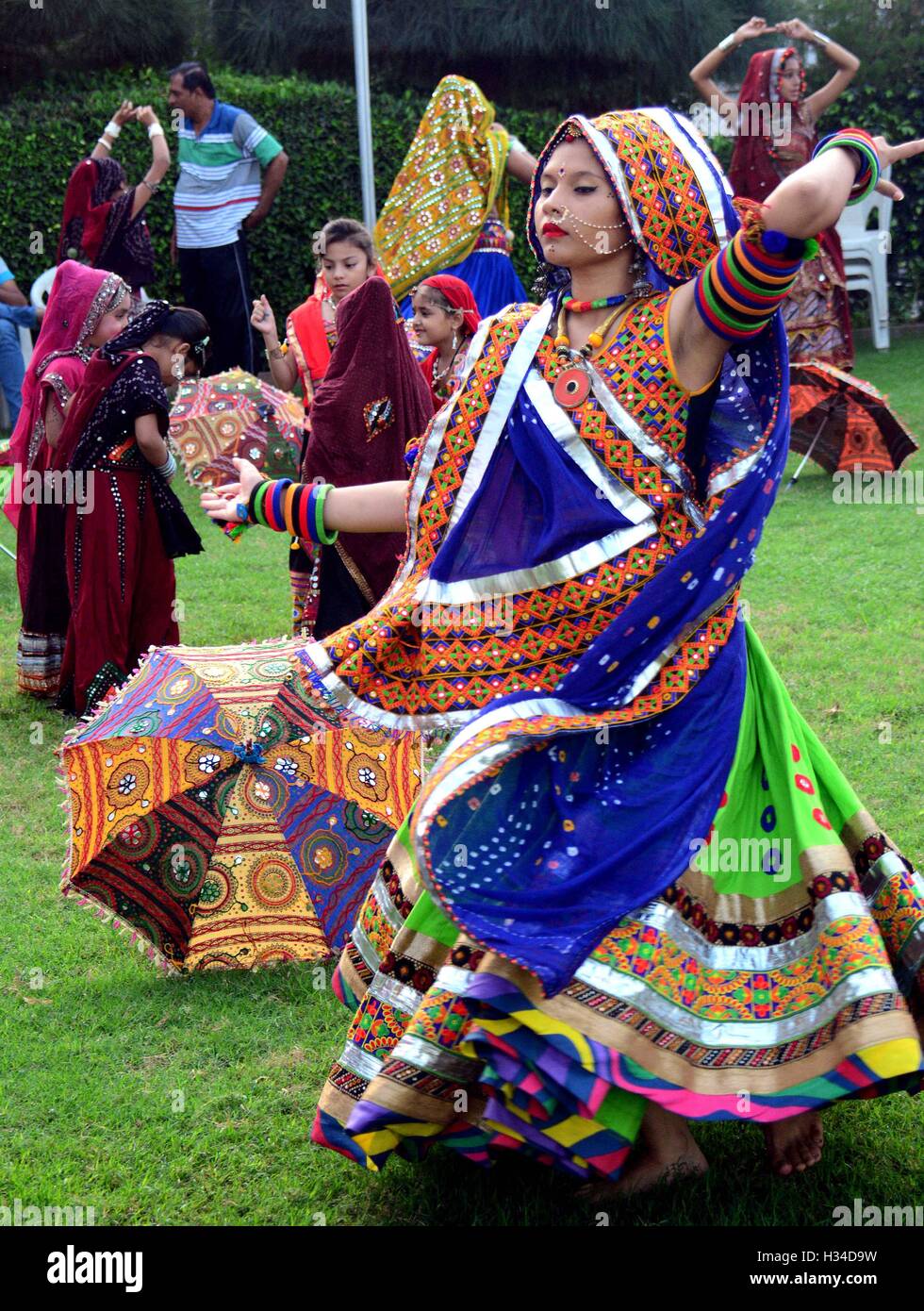 Indian girls practice the Garba dance steps in preparation for the