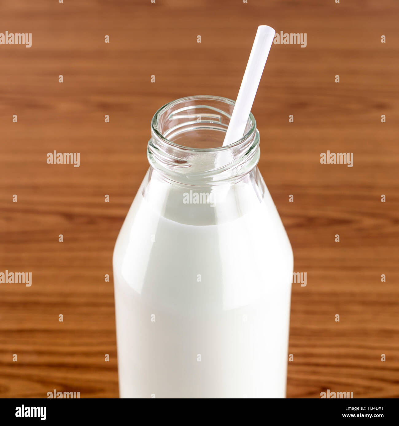 milk with straw in a glass of bottle Stock Photo - Alamy