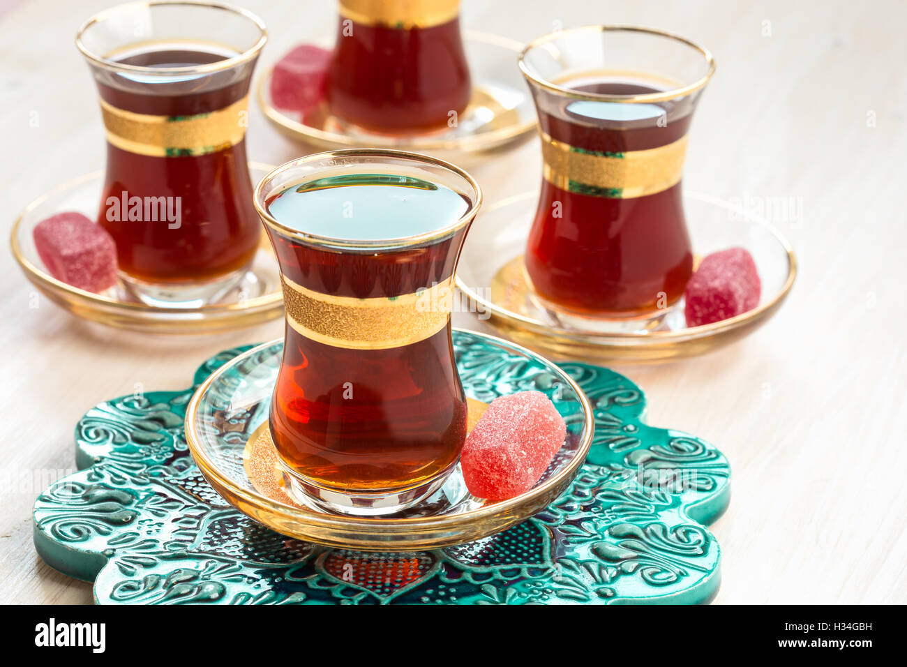 Turkish tea pot with glass of tea Stock Photo - Alamy