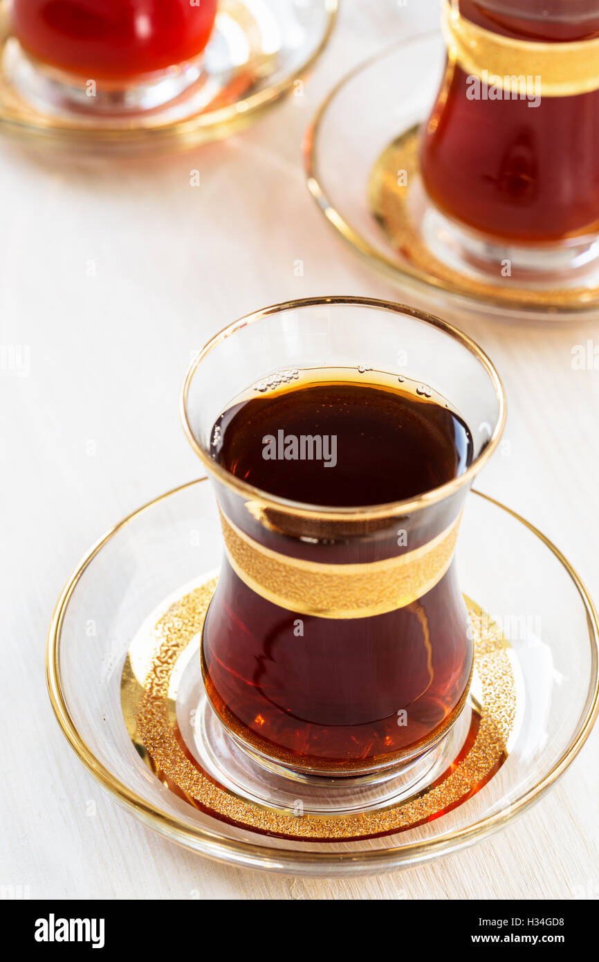 https://c8.alamy.com/comp/H34GD8/very-taste-black-turkish-tea-drinking-traditional-turkish-tea-in-glasses-H34GD8.jpg