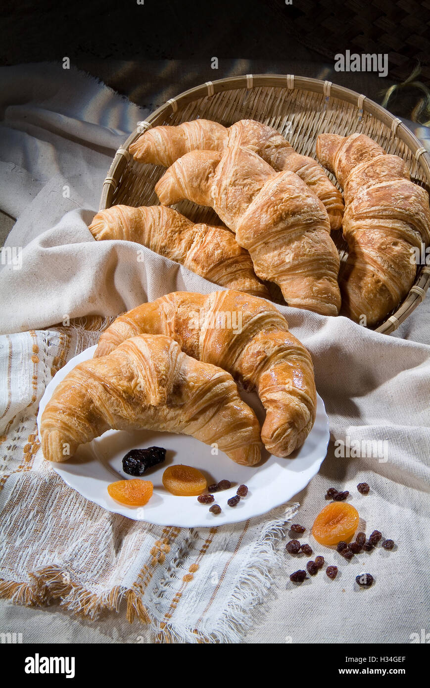 Different kinds of bread and pastry on a canvas studio background Stock
