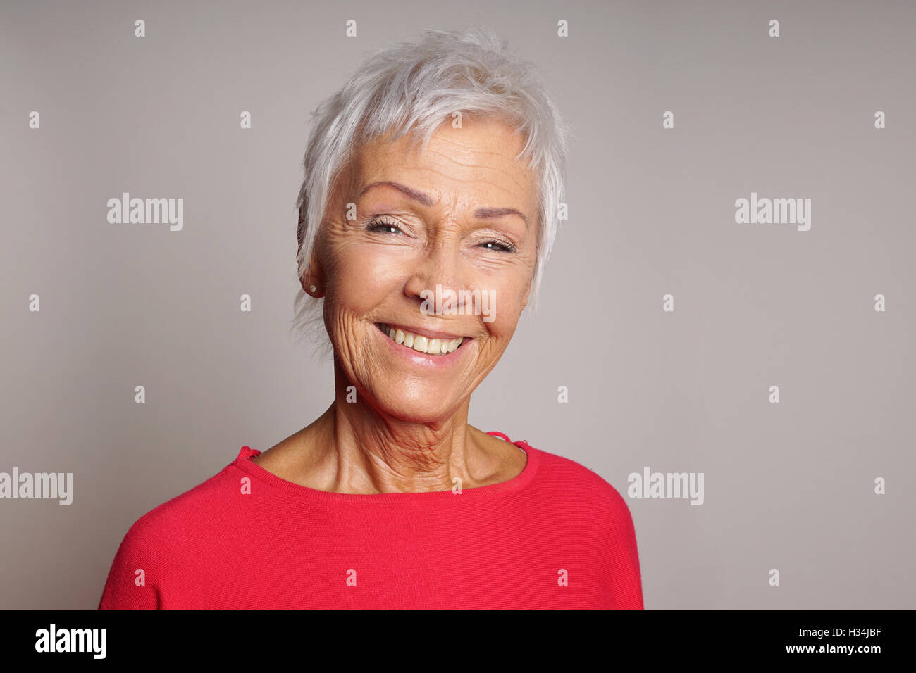 happy mature woman in her sixties Stock Photo