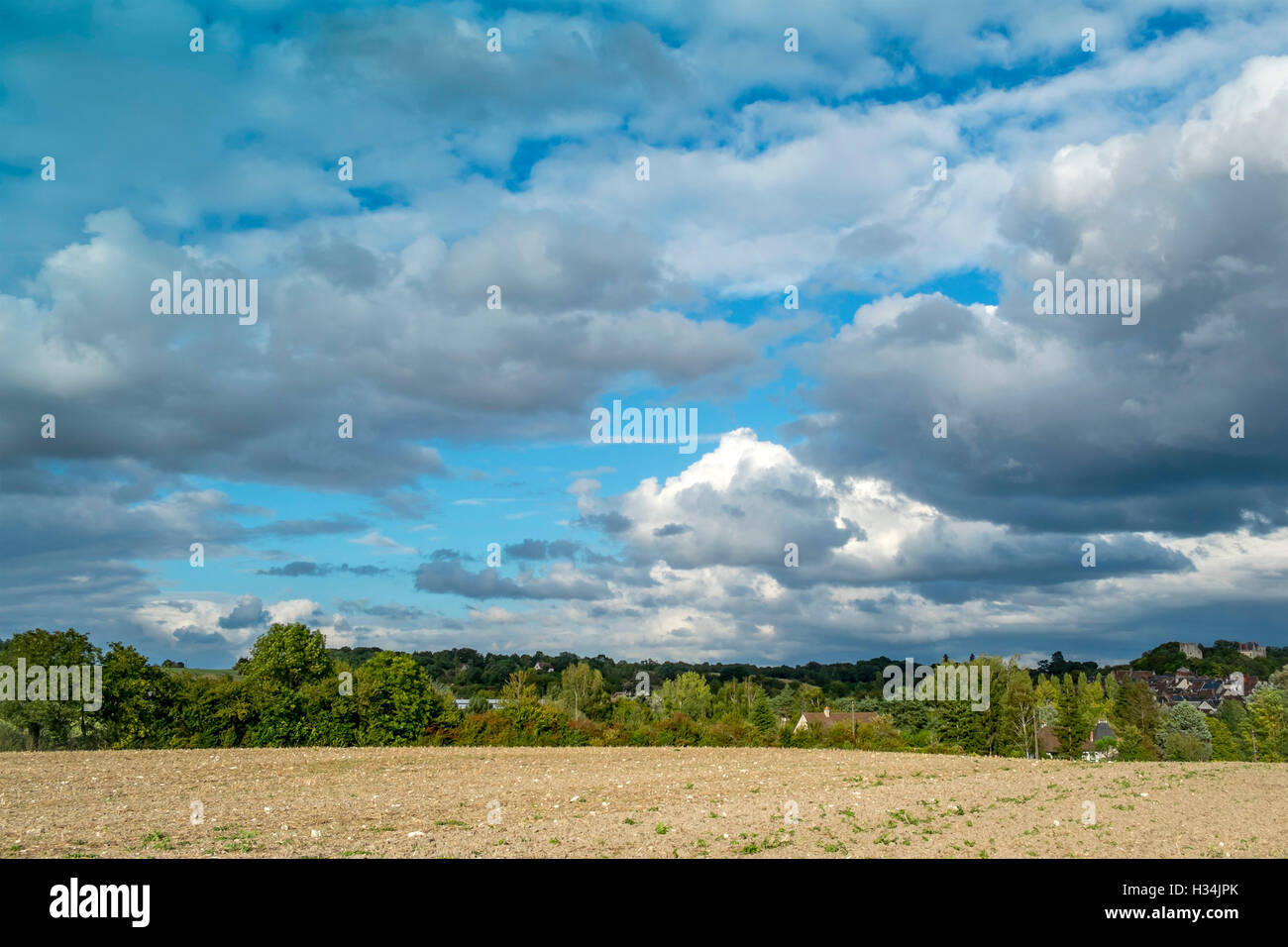 Storm clouds gathering over farmland - France. Stock Photo