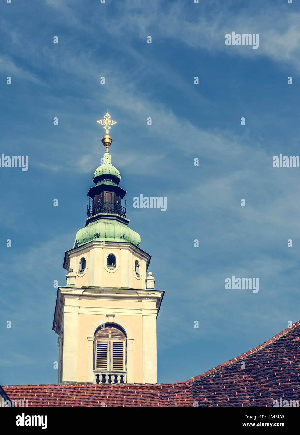Church bell tower on blue sky Stock Photo - Alamy