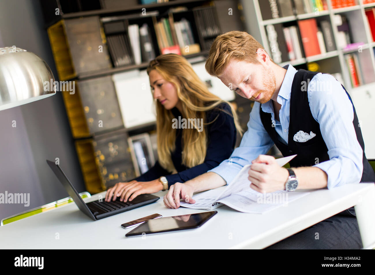 Young business people are in the office and working together Stock ...