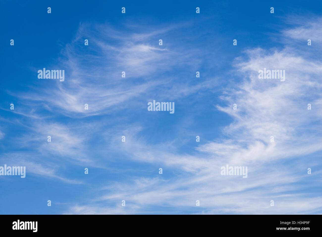 Cirrus clouds in a pleasing skyscape Stock Photo