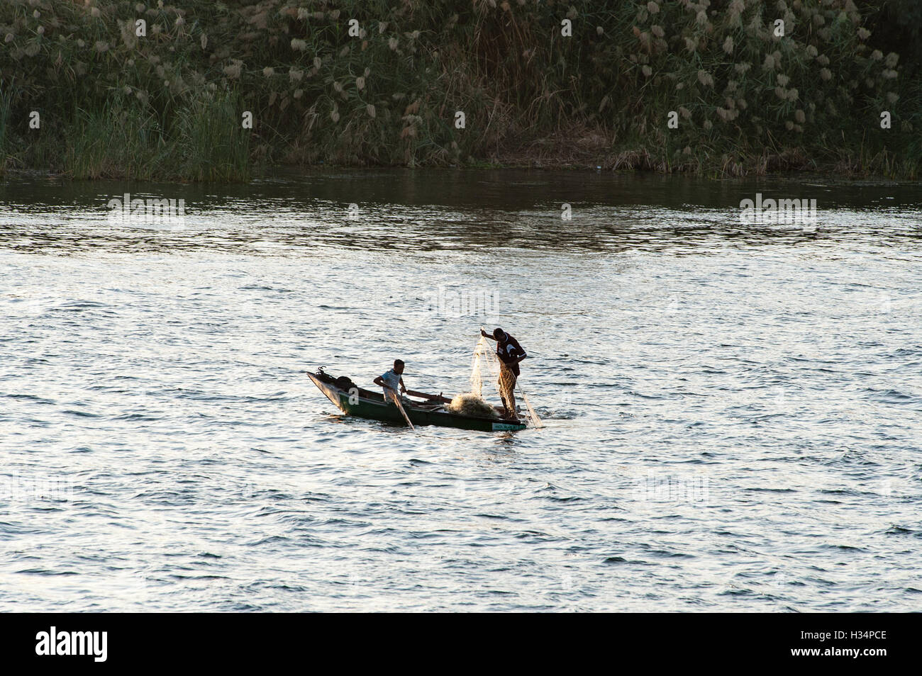 Egypt. Cruising the Nile from Kom Ombo to Luxor, passing Edfu and Esna. Fishermen at the Nile. Stock Photo