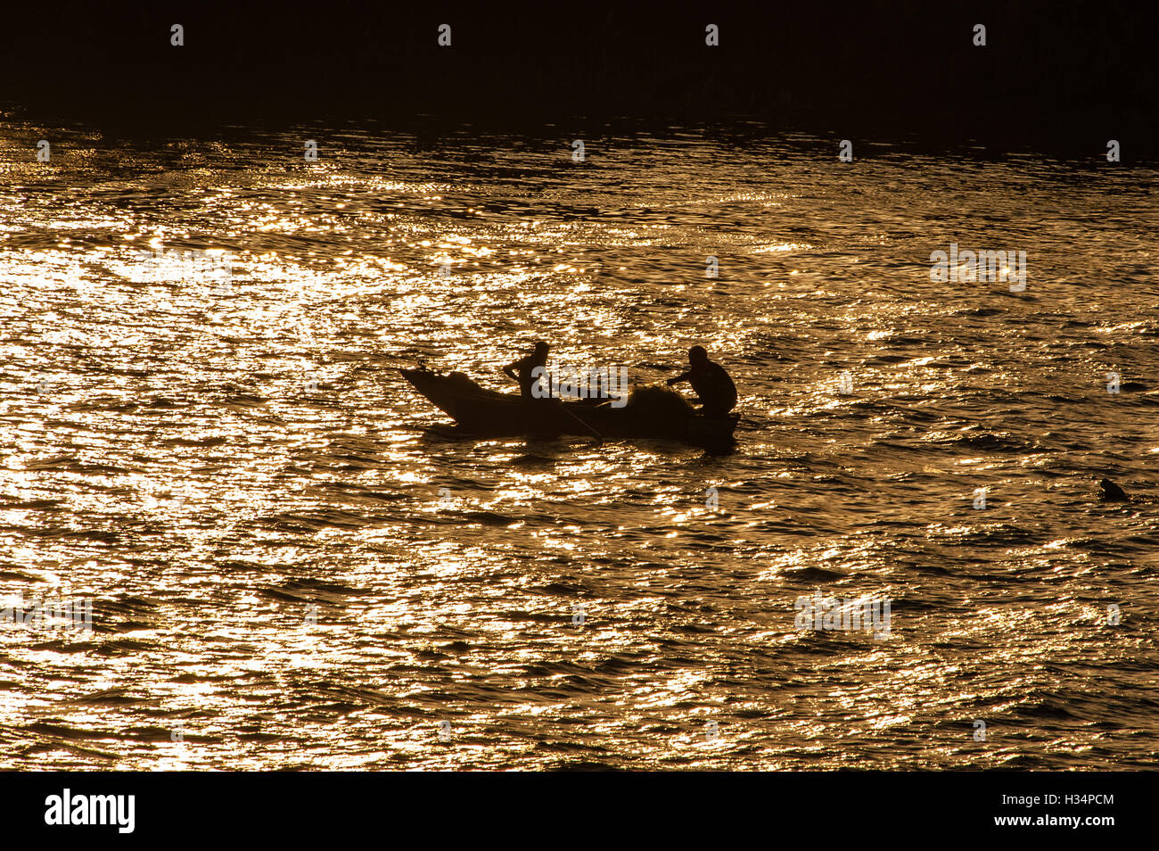 Egypt. Cruising the Nile from Kom Ombo to Luxor, passing Edfu and Esna. Fishermen at the Nile. Stock Photo