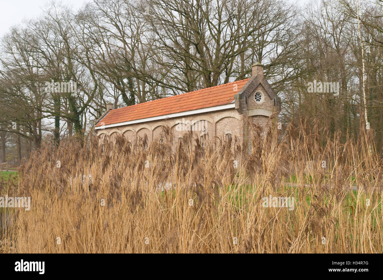 restored sluice house or Schuivenhuisje in dutch language along the
