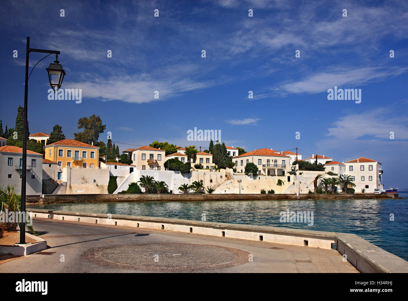 Beautiful houses in Spetses town (Agios Nikolaos neighborhood), Spetses island, Attica, Greece. Stock Photo