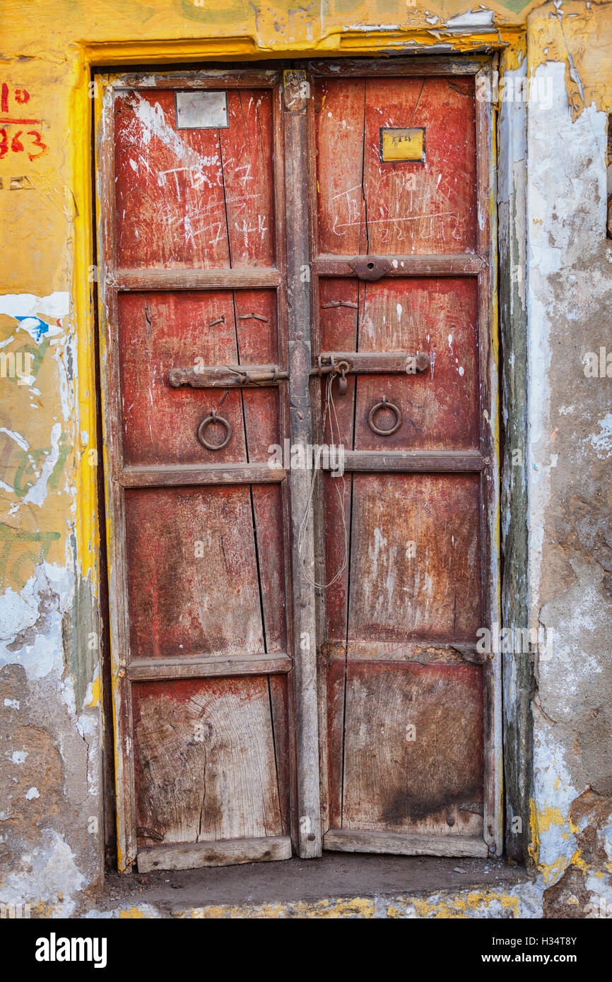 Ancient red wooden door with iron lock, India Stock Photo - Alamy