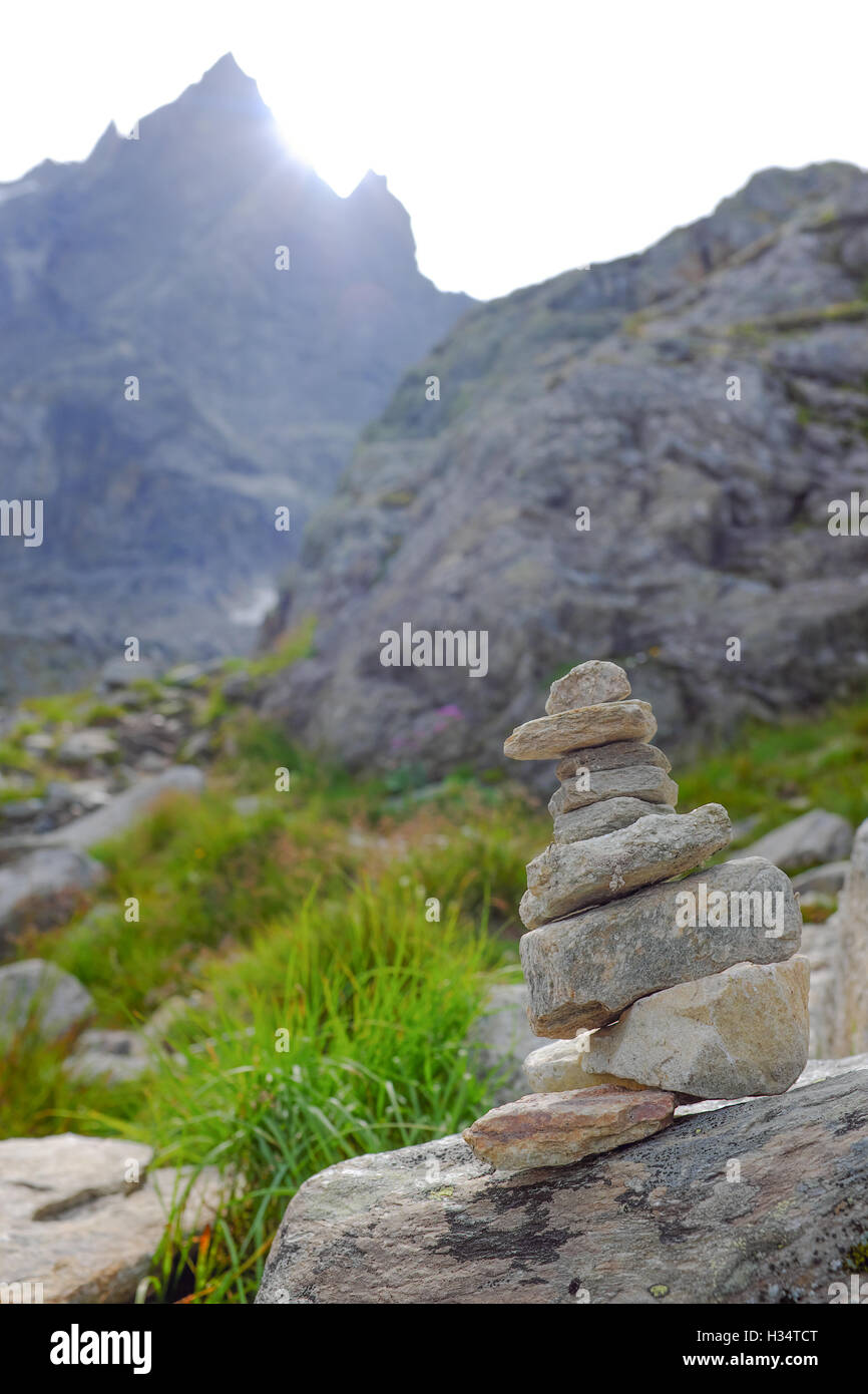 A cairn marker on the trail from Plan de l'Aiguille to Blue Lake near Chamonix, France. Stock Photo