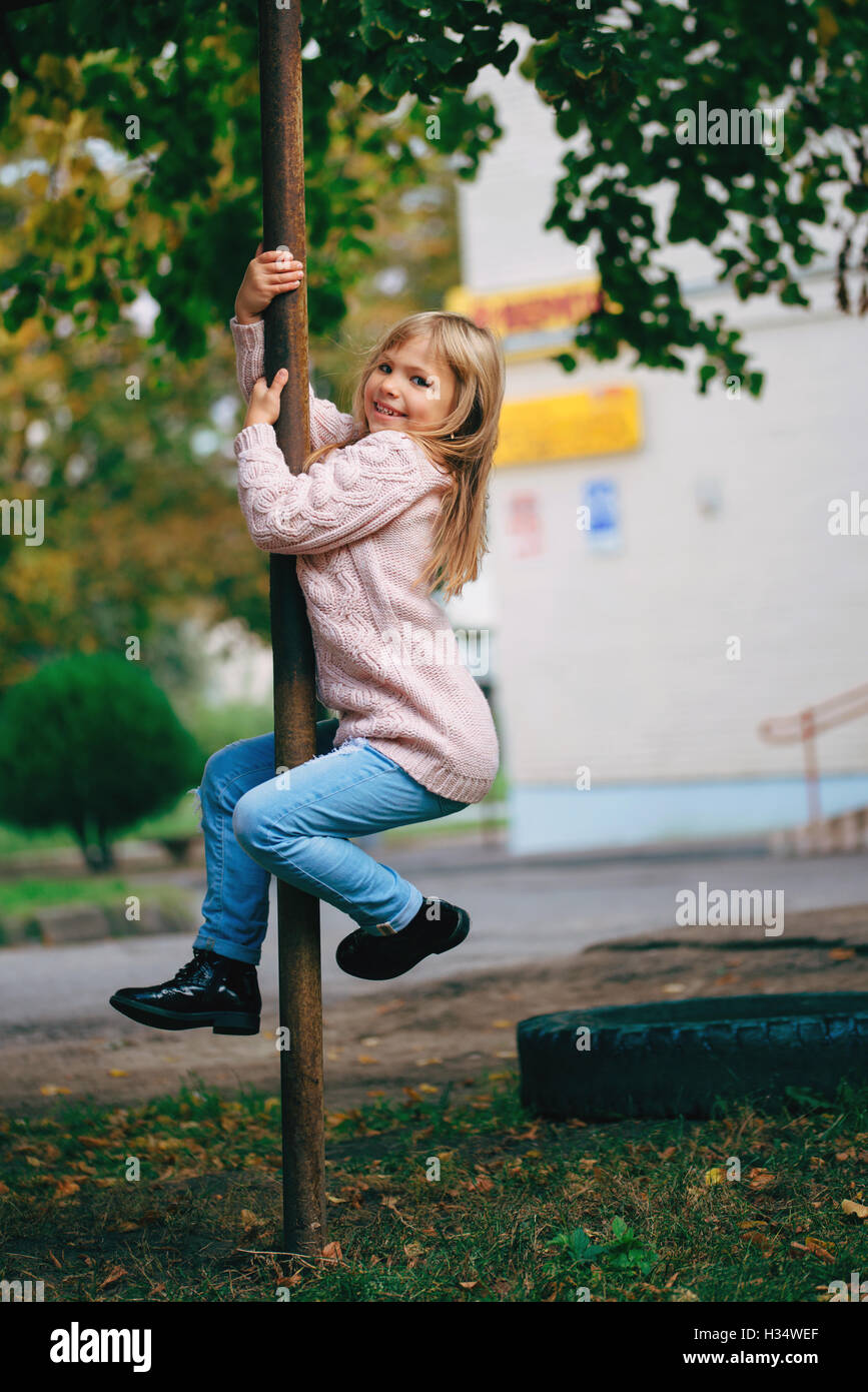 Child girl climbing frame hires stock photography and images Alamy