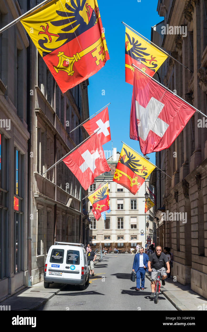 Flags of Switzerland and of the Canton of Geneva,  Rue de l'Hôtel de Ville, Geneva, Switzerland Stock Photo