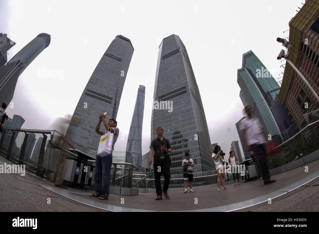 Los Angeles, California, USA. 8th Sep, 2016. People walk across the bridge at Mingzhu Roundabout in Shanghai, China. Shanghai is the most populous city in China and the most populous city proper in the world. It is one of the four direct-controlled municipalities of China, with a population of more than 24 million as of 2014. It is a global financial centre, and a transport hub with the world's busiest container port. Located in the Yangtze River Delta in East China, Shanghai sits on the south edge of the mouth of the Yangtze in the middle portion of the Chinese coast. The municipality Stock Photo