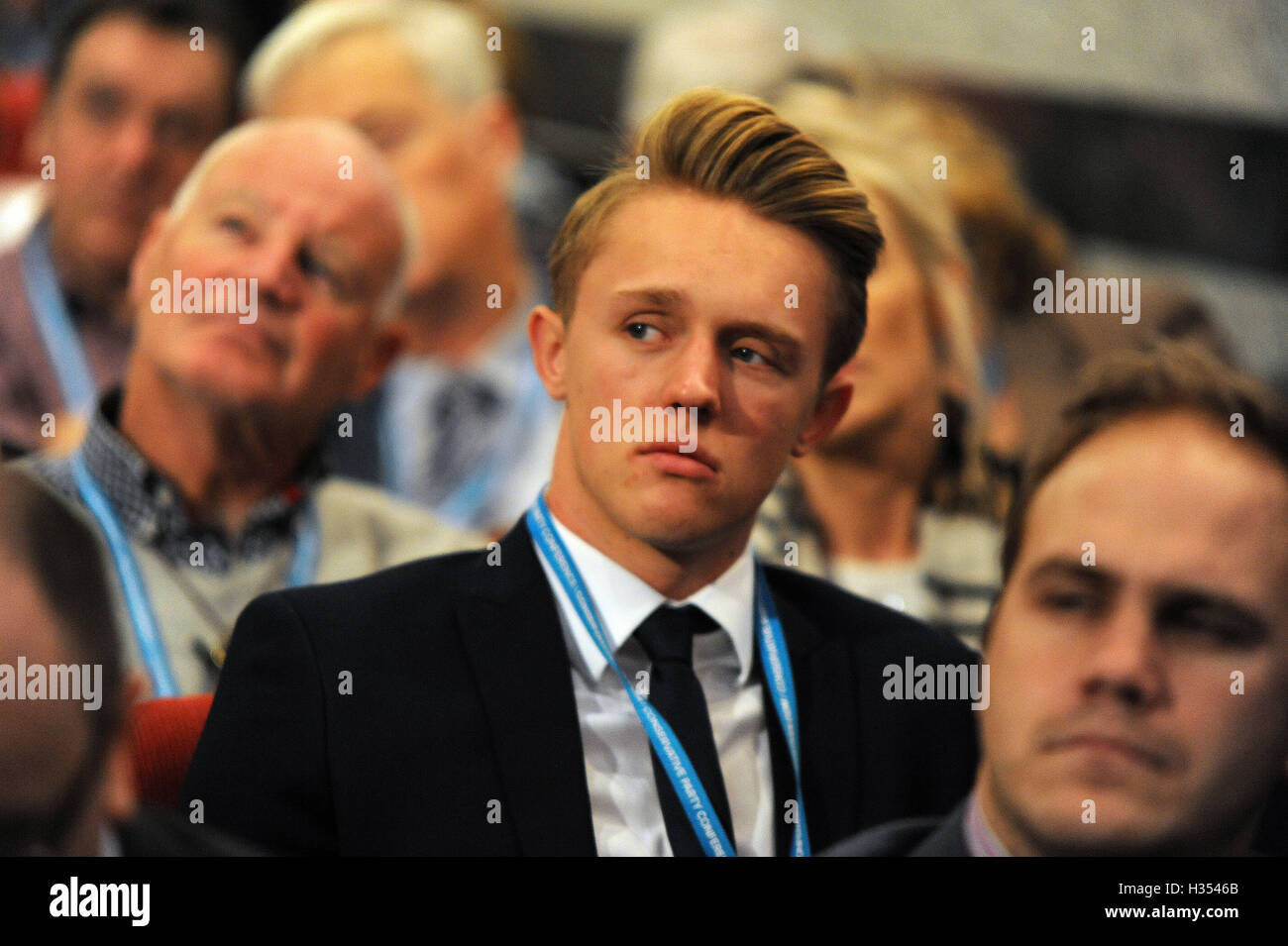 Birmingham, UK. 4th Oct, 2016. A young conservative delegate listening