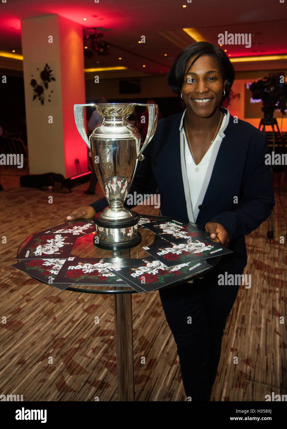 London, UK. 05th October 2016. Former England international and RFU Council member Maggie Alphonsi with the Rugby World Cup trophy she won playing for England in 2014 during the media briefing for the unveiling of the new vision for women’s rugby in England as part of Women’s Sport Week (3 - 9 October 2016). Also present were RFU Chief Executive Ian Ritchie and RFU Professional Rugby Director Nigel Melville. Credit:  Elsie Kibue / Alamy Live News Stock Photo