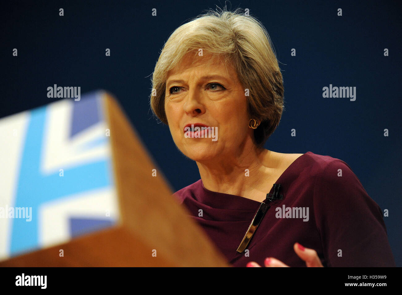 Birmingham, UK. 5th Oct, 2016. Theresa May, Prime Minister and Leader of the Conservative Party delivers her speech to conference, on the fourth and final day of the Conservative Party Conference at the ICC Birmingham. The theme of the speech was 'A Country that Works for Everyone'. This conference follows the referendum decision for the UK to leave the European Union, and the subsequent election of Theresa May as leader of the Conservative Party. Credit:  Kevin Hayes/Alamy Live News Stock Photo