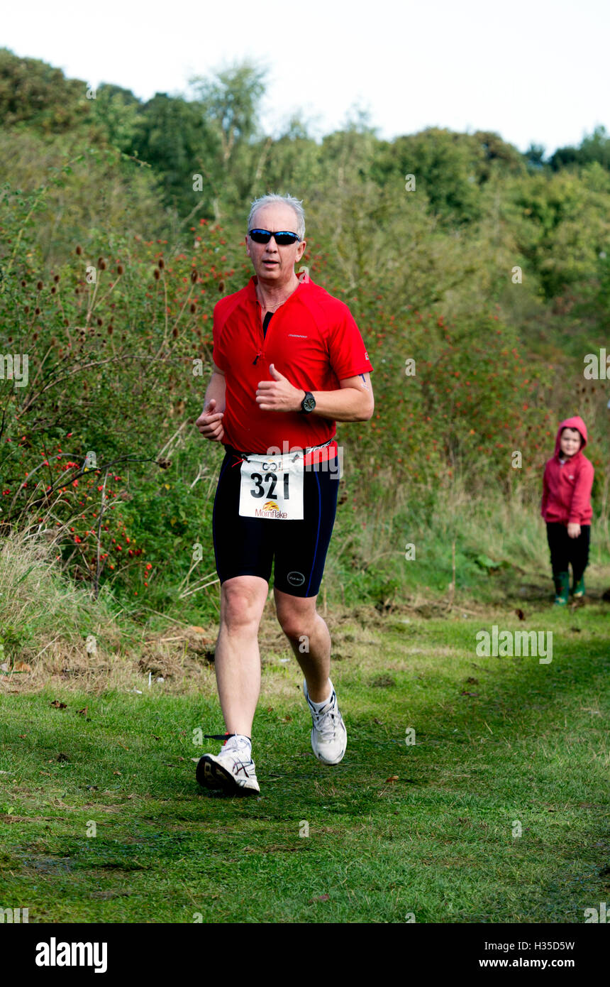 A man running in the Warwickshire Triathlon, Stratford-upon-Avon, UK Stock Photo