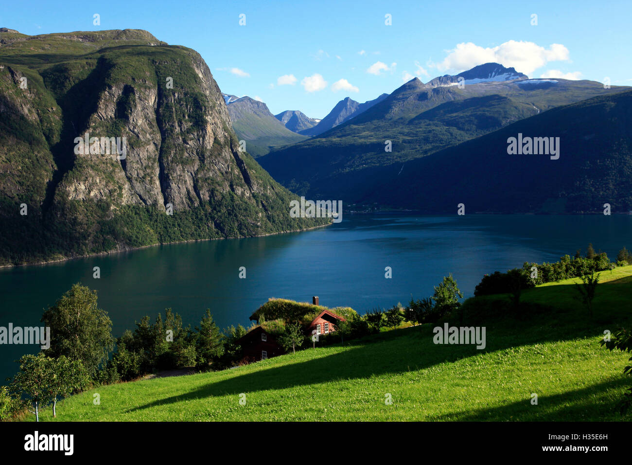 A house above the fjord at Valldal, Norway Stock Photo