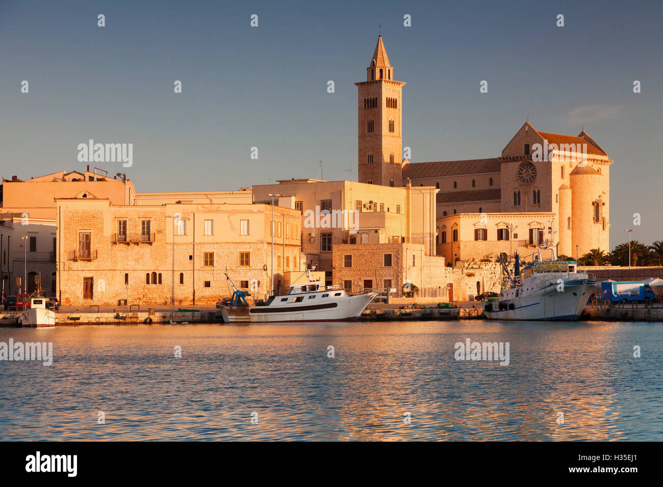 San Nicola Pellegrino cathedral, at sunrise, harbour, Trani, Le Murge, Barletta-Andria-Trani district, Puglia, Italy Stock Photo