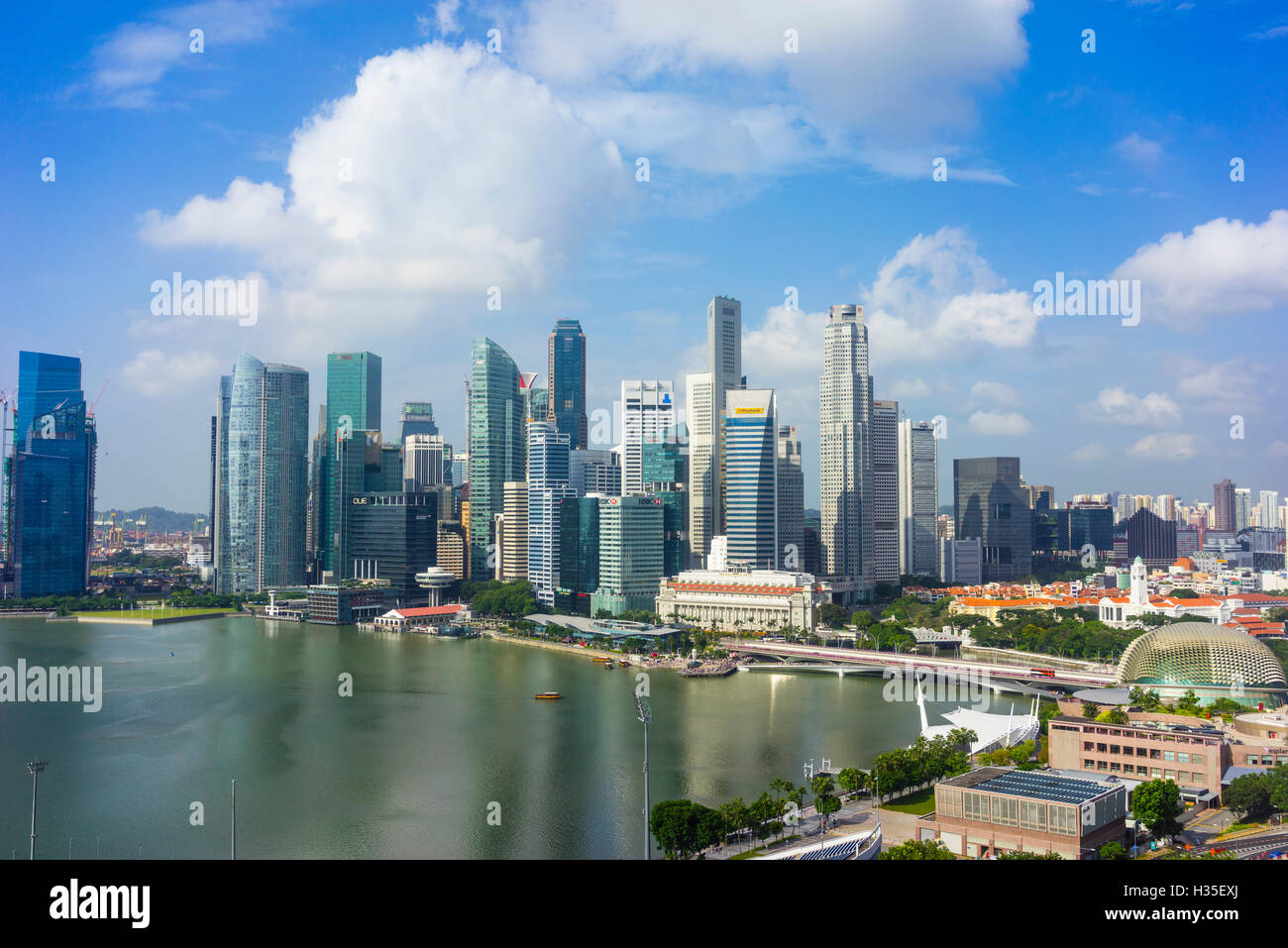 Singapore skyline, skyscrapers with the Fullerton Hotel and Jubilee Bridge in the foreground by Marina Bay, Singapore Stock Photo
