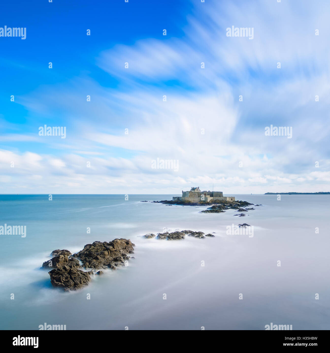 Saint Malo beach, Fort National and rocks during High Tide. Brittany, France, Europe. Long exposure photography Stock Photo