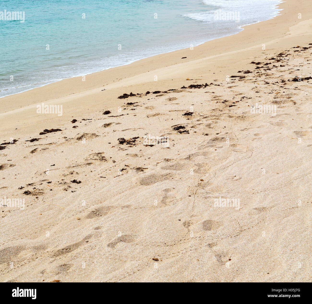 near sandy beach sky and mountain in oman arabic sea the hill Stock
