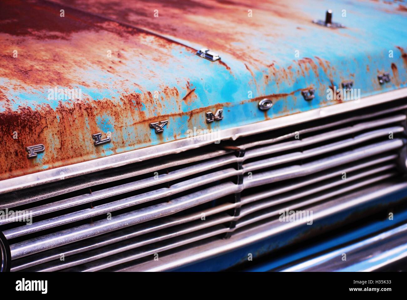 Old rusted Plymouth grill Stock Photo