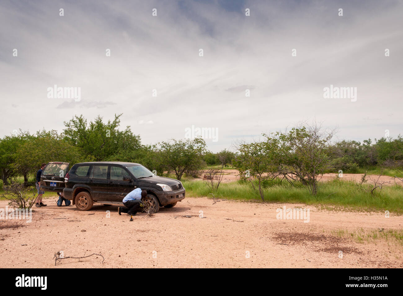 Flat tyre in the middle of nowhere Stock Photo