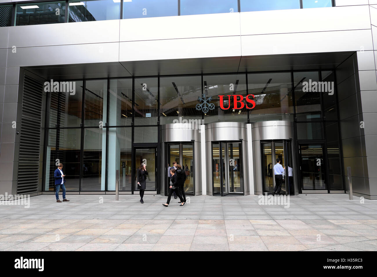 Entrance of 5 Broadgate UBS building exterior HQ headquarters sign people  financial services investment bank in the City of London UK   KATHY DEWITT Stock Photo