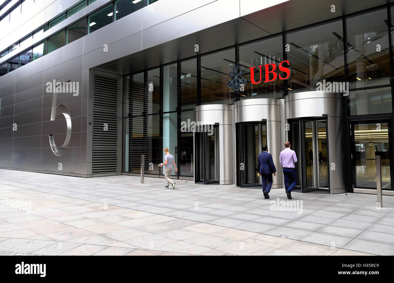 Entrance of 5 Broadgate UBS building exterior HQ headquarters sign people  financial services investment bank in the City of London UK   KATHY DEWITT Stock Photo
