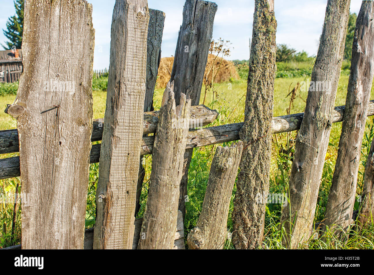 old wooden fence outdoor on summer day closeup Stock Photo - Alamy