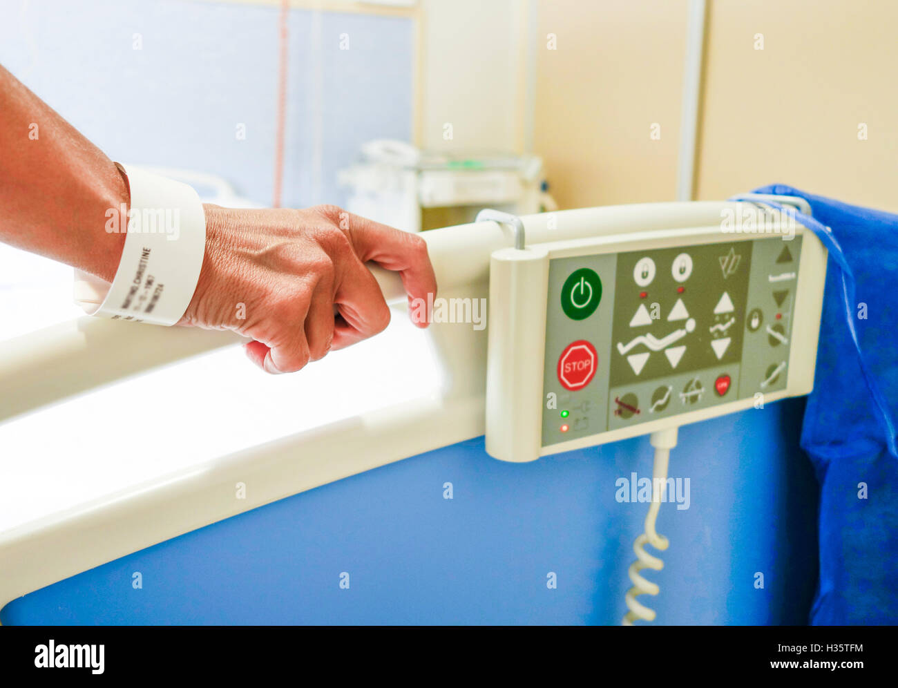 Hospital bed remote control panel for making bed adjustments and hand