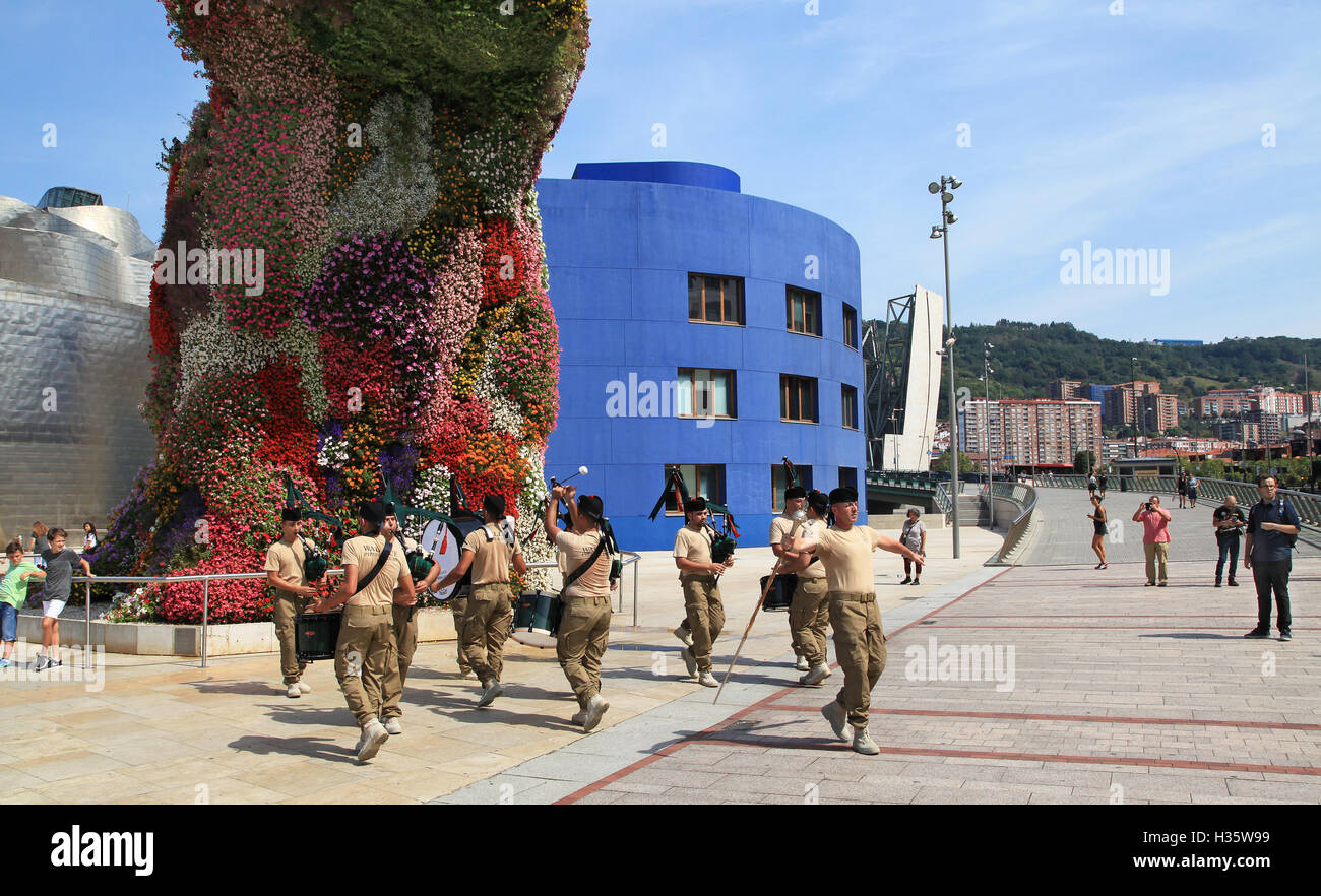 Giant Puppy and Wallace pipes and drums at bilbao spain. Stock Photo