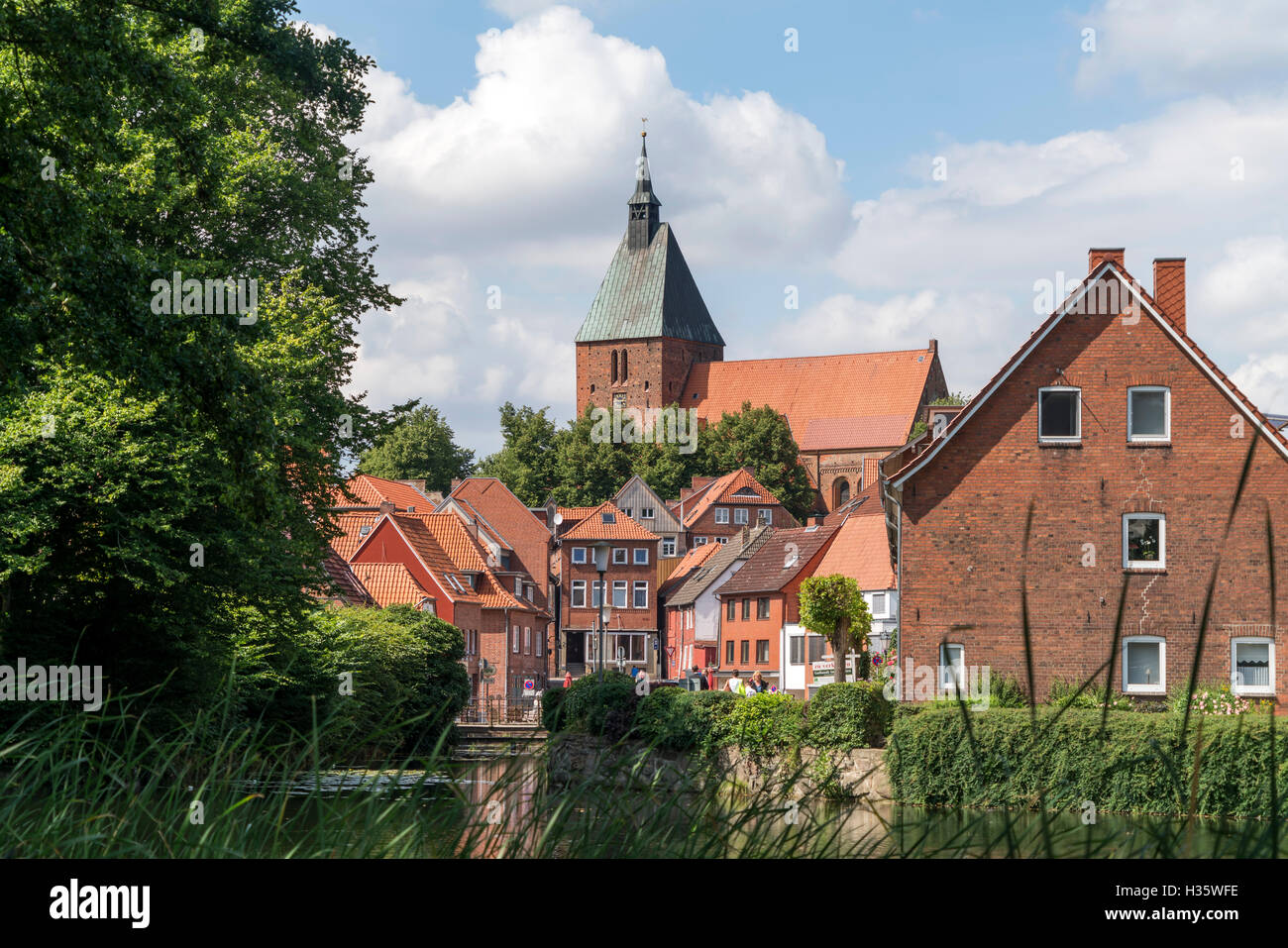moat Wallgraben and St. Nicolai church in Moelln,  Schleswig-Holstein, Germany, Europe Stock Photo