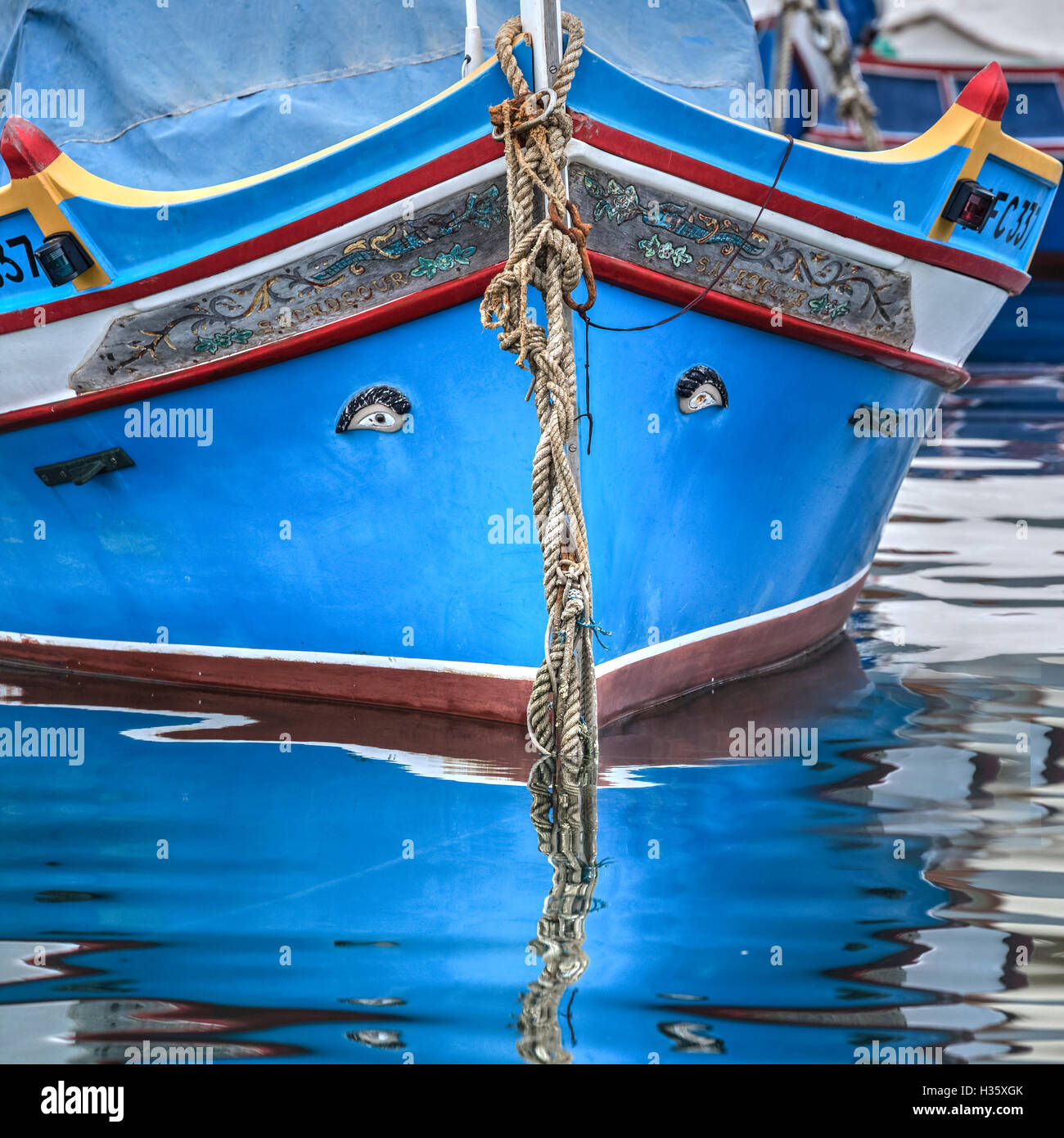 Bow of traditional Maltese fishing boat called Luzzu, with the Eye of Horus or Osiris Stock Photo